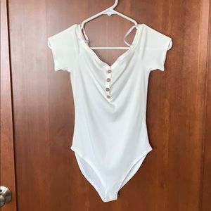 Creme half buttoned body suit!